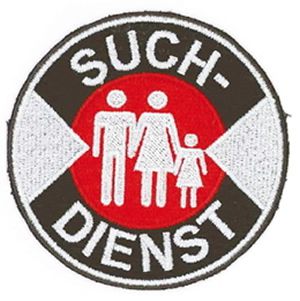 Foto: Zu sehen ist das Fachdienstabzeichen des DRK-Suchdienstes.